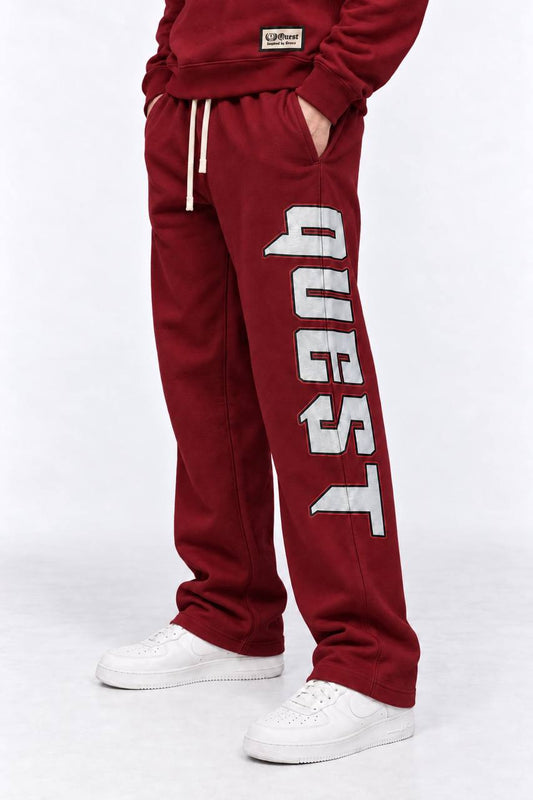 Off white relaxed sweatpants with outlined QUEST leg print